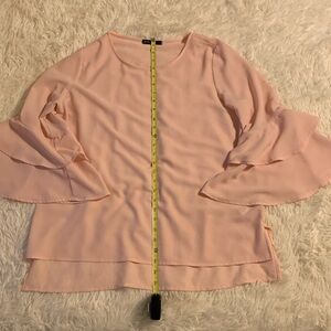 Women’s long sleeve light pink blouse